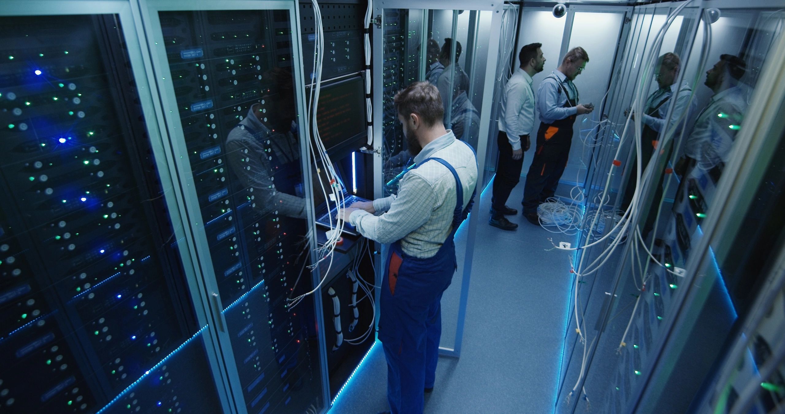 Energy professionals collaborating in a control room